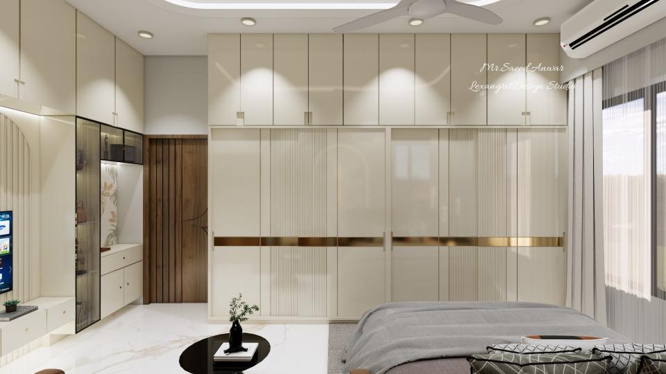 Sliding fluted laminate wardrobe design with a wardrobe golden strip design and a space-saving console table unit beside it, showcasing modern fluted laminate wardrobe design with clean detailing for stylish bedroom interiors.