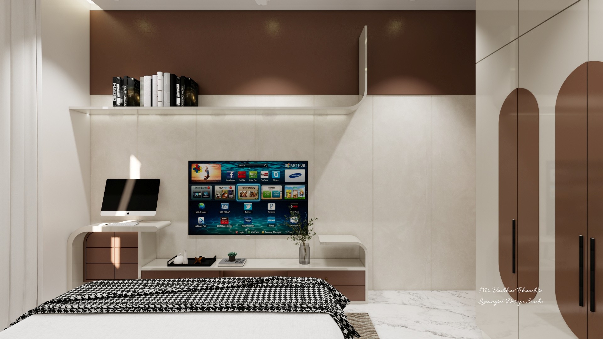 Floating desk and wall-mounted screen sit beneath a broad brown panel, with books, pale cabinetry, and arched wardrobe doors.