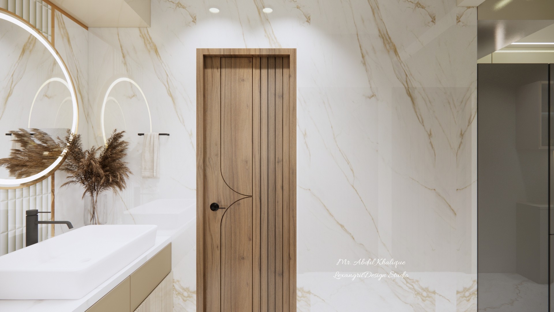 A handwash area where tiles do the talking — pattern and texture climbing the wall behind the basin, turning a functional corner into a focal point.