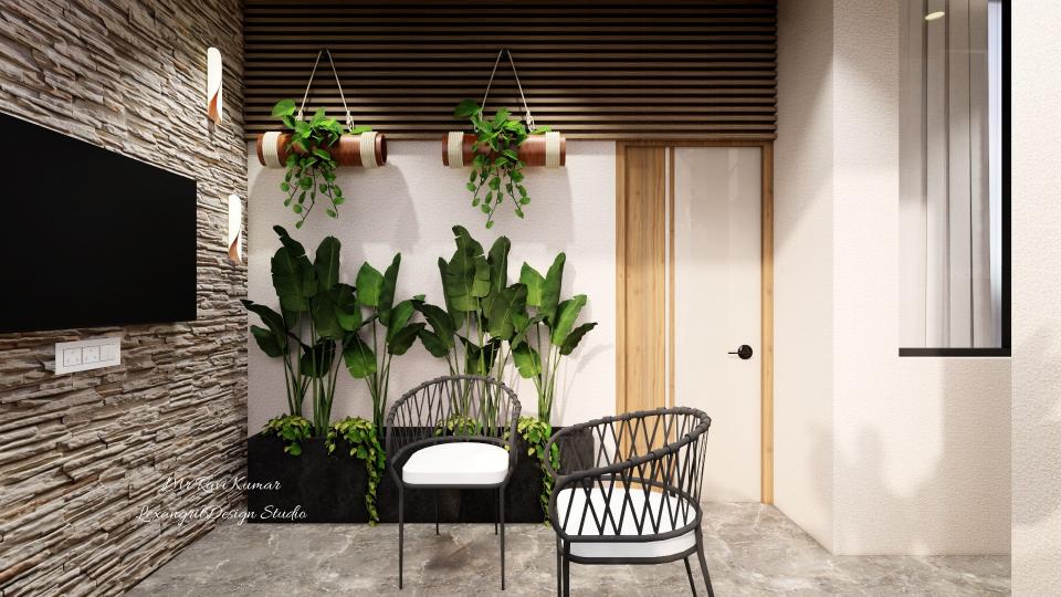 Contemporary balcony with tropical plants in bamboo planters, wooden slats above the lintel, a stacked-stone accent wall with wall-mounted TV on the left, two modern black wire chairs with white cushions, and grey stone-textured tile flooring.