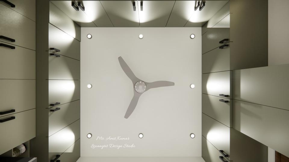 Top view of the dining area ceiling showing symmetrical upper cabinetry layout with recessed spotlights and a central grey ceiling fan.