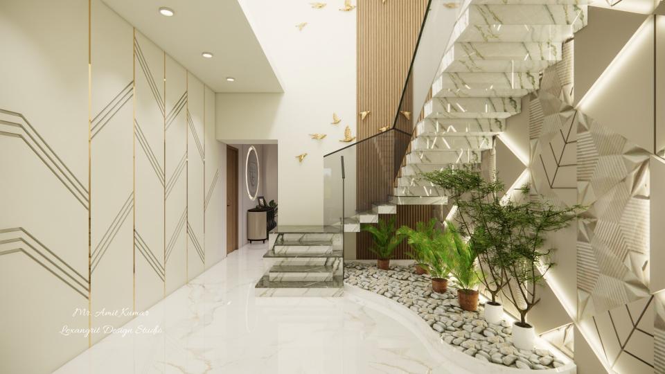 Grand stair house design in a living and dining area featuring a staircase with glass railing, wooden PVC louver side wall glass design, under-stair rock garden with plants, and textured wall with integrated lighting.