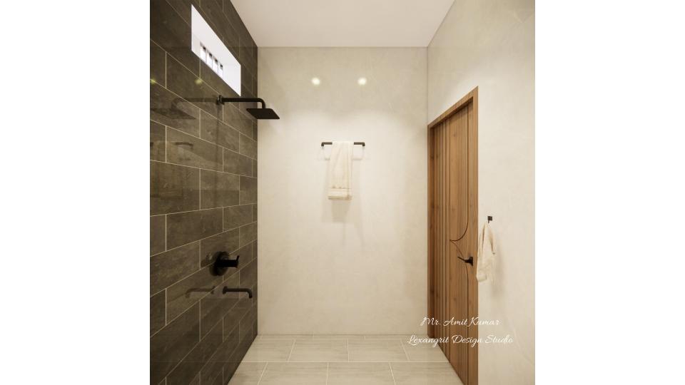 Bathroom view with a matte black cloth hanger and dark grey tiled wall with matte black accessories on the left, and a wooden textured door on the right.