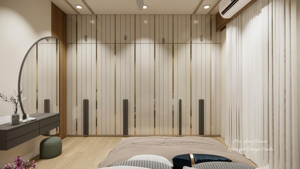 A view of the bedroom highlighting a large wall of floor-to-ceiling beige wardrobes with gold vertical pattis and sleek black handles, showing a moon-shaped mirror with a console.