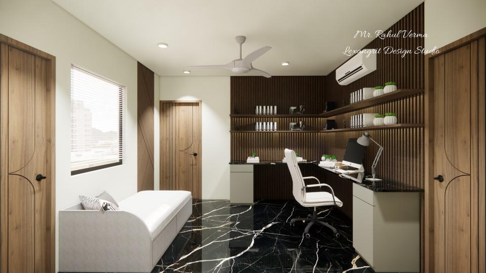 Office room showing sitting area with designing wall & work station