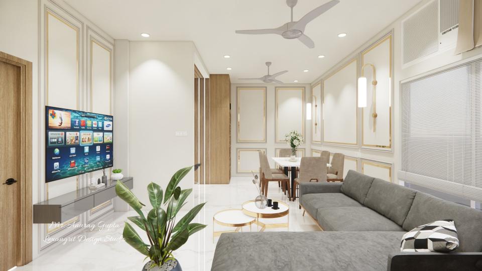 Image of the living room featuring a modern entertainment center with a flat-screen TV and built-in shelves against a sleek accent wall