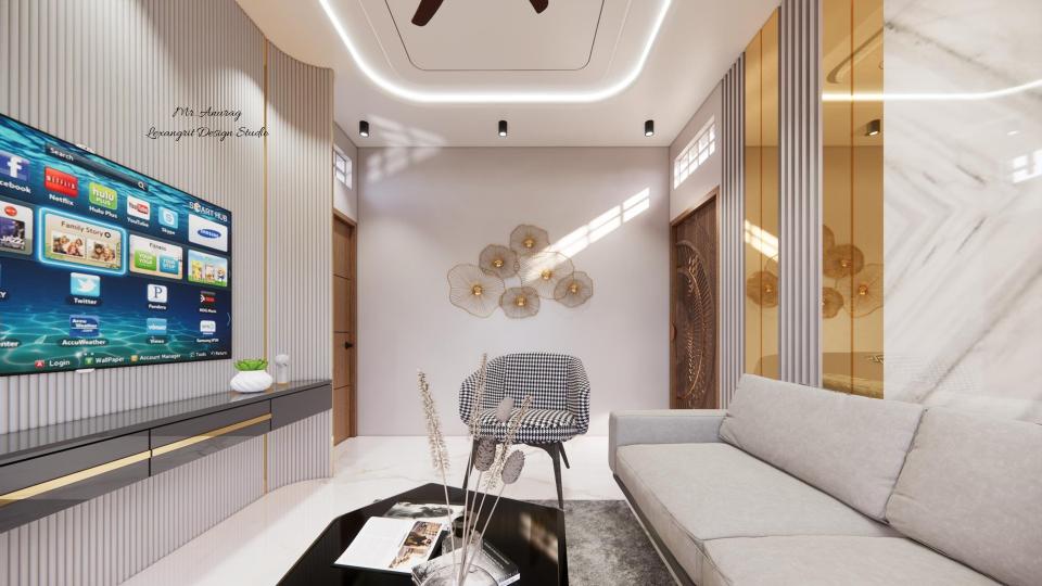 Image of the drawing  room featuring a modern entertainment center with a flat-screen TV and built-in shelves against a sleek accent wall