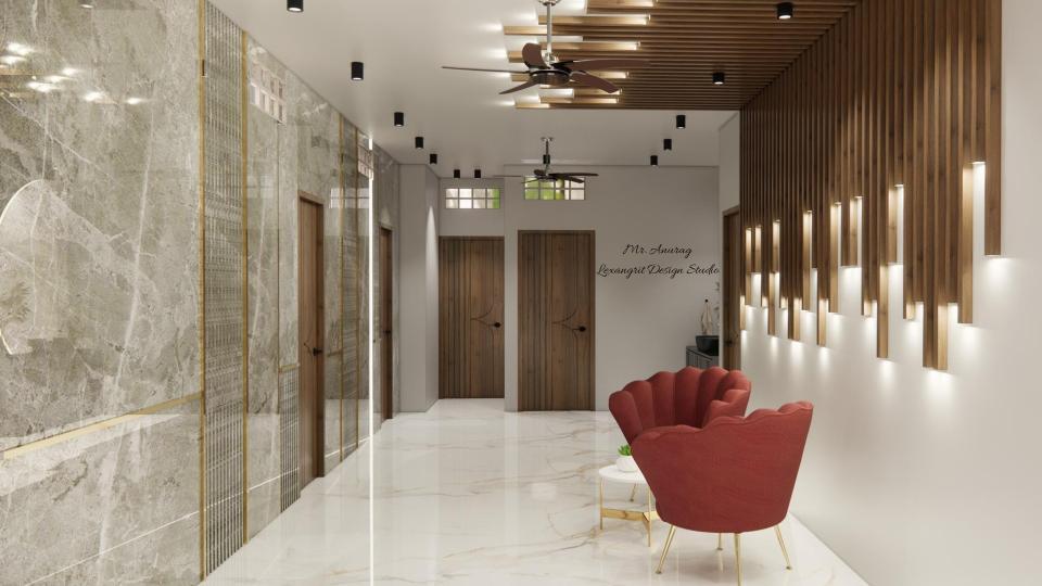 Image of the lobby area seating area and decorative wall with cov lights