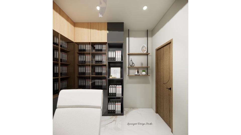 Image of the study room displaying a stylish bookcase filled with books and decorative items against a neutral-toned wall