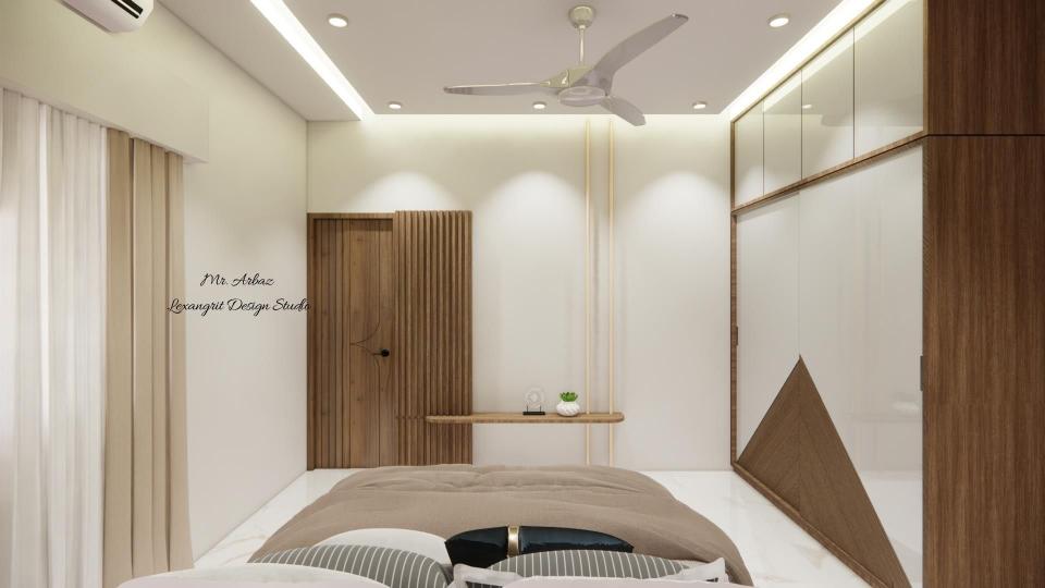 Image of the  bedroom highlighting a spacious wardrobe with sliding door and decorative wall