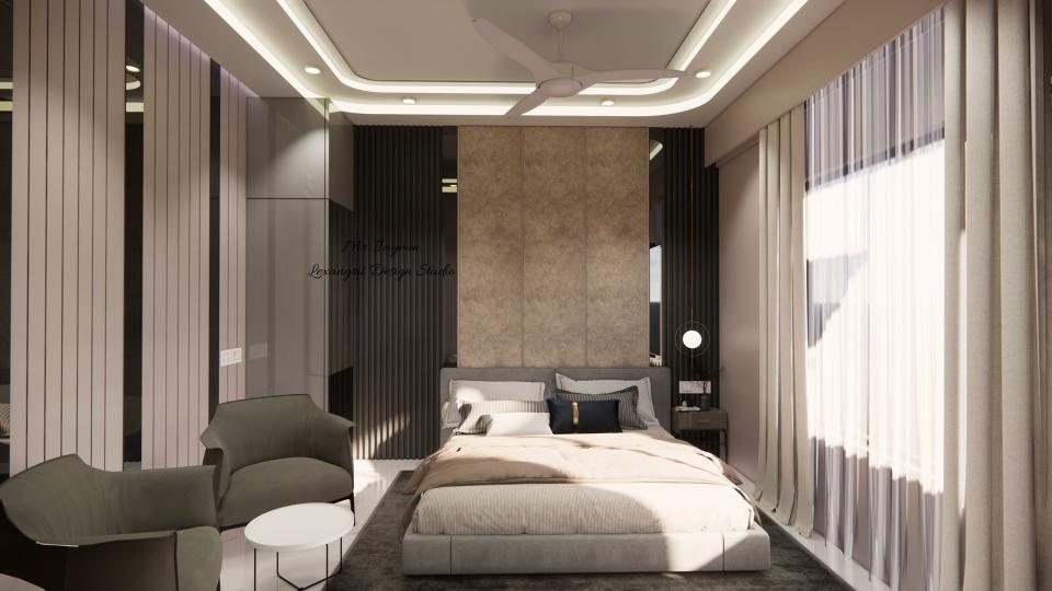 Image of the first floor  bedroom 1 displaying a comfortable seating area with a chaise lounge, side table, and a lamp against a decorated wall