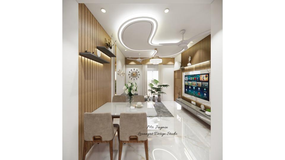 Image of the living room featuring a modern entertainment center with a flat-screen TV and built-in shelves against a sleek accent wall