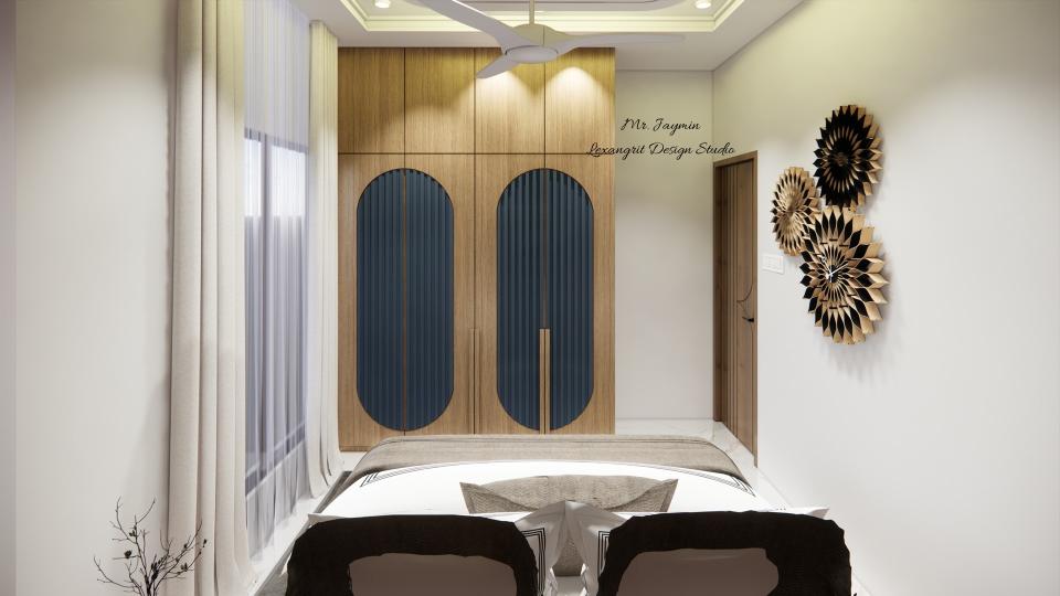 Wooden laminated arch shaped wardrobe with blue louvers between arches and loft storage above for modern bedroom interior design.