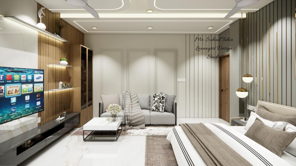 Image of the master bedroom displaying a comfortable seating area with a chaise lounge, side table, and a lamp against a decorated walll