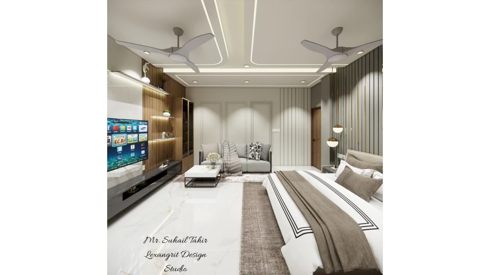 Image of the master bedroom displaying a comfortable seating area with a chaise lounge, side table, and a lamp against a decorated walll zoom out view