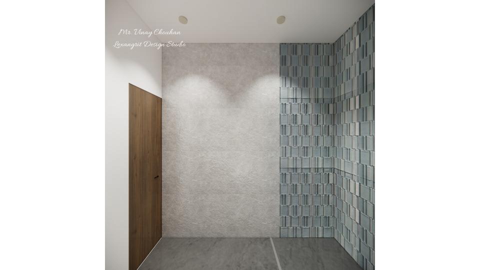 bathroom showcasing a spacious shower area with a glass partition and modern fixtures against a tiled wall