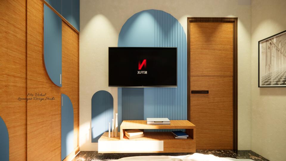 Image of the guest room showcasing sleek tv unit and stylish sliding wardrobe