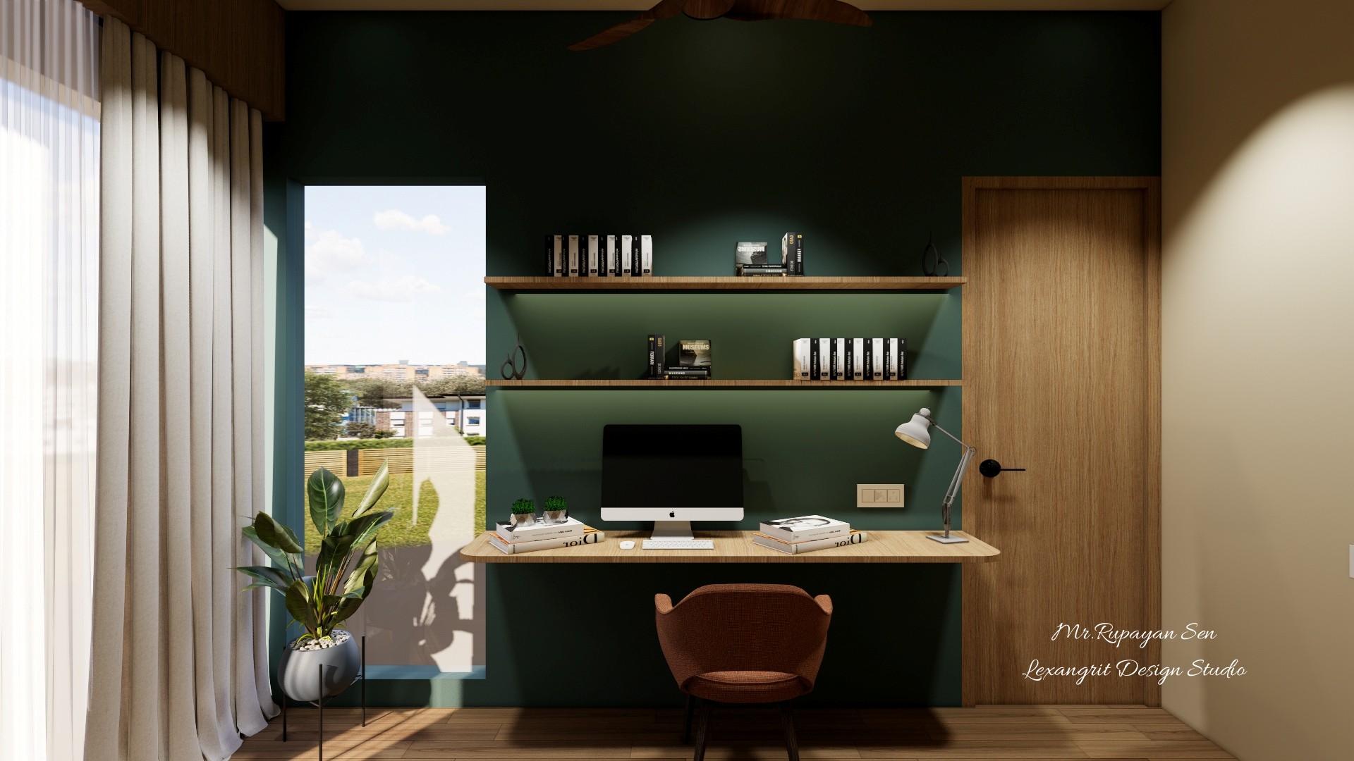Compact study with a deep green desk wall, timber shelves, computer, leather chair, and curtained window.