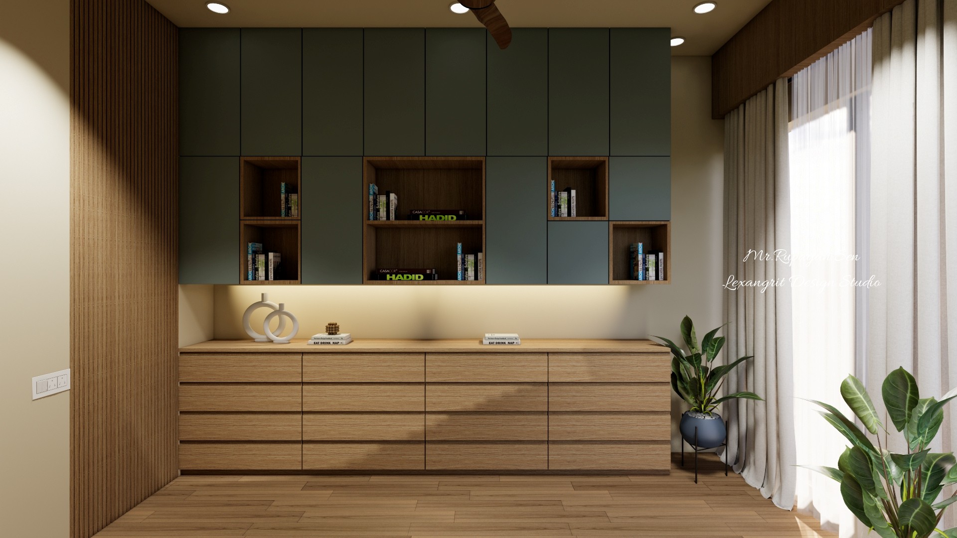 Home office storage wall with muted green cabinets, timber drawers, open shelves, and a bright curtained window.