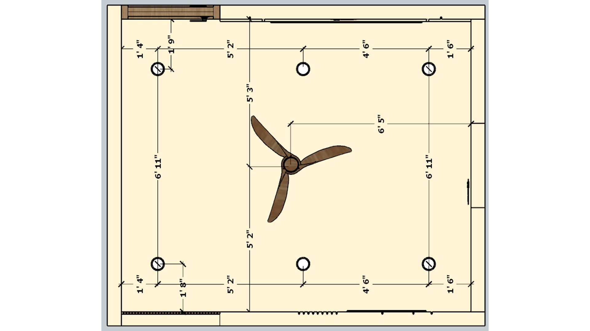 Living room ceiling plan marks fan placement and evenly spaced recessed lights within a rectangular layout.