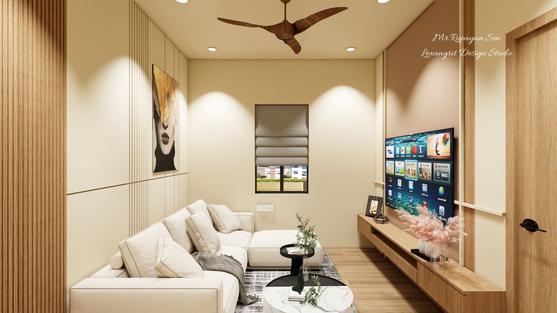 Neutral living room with an L shaped cream sofa, black round tables, graphic rug, and television console.