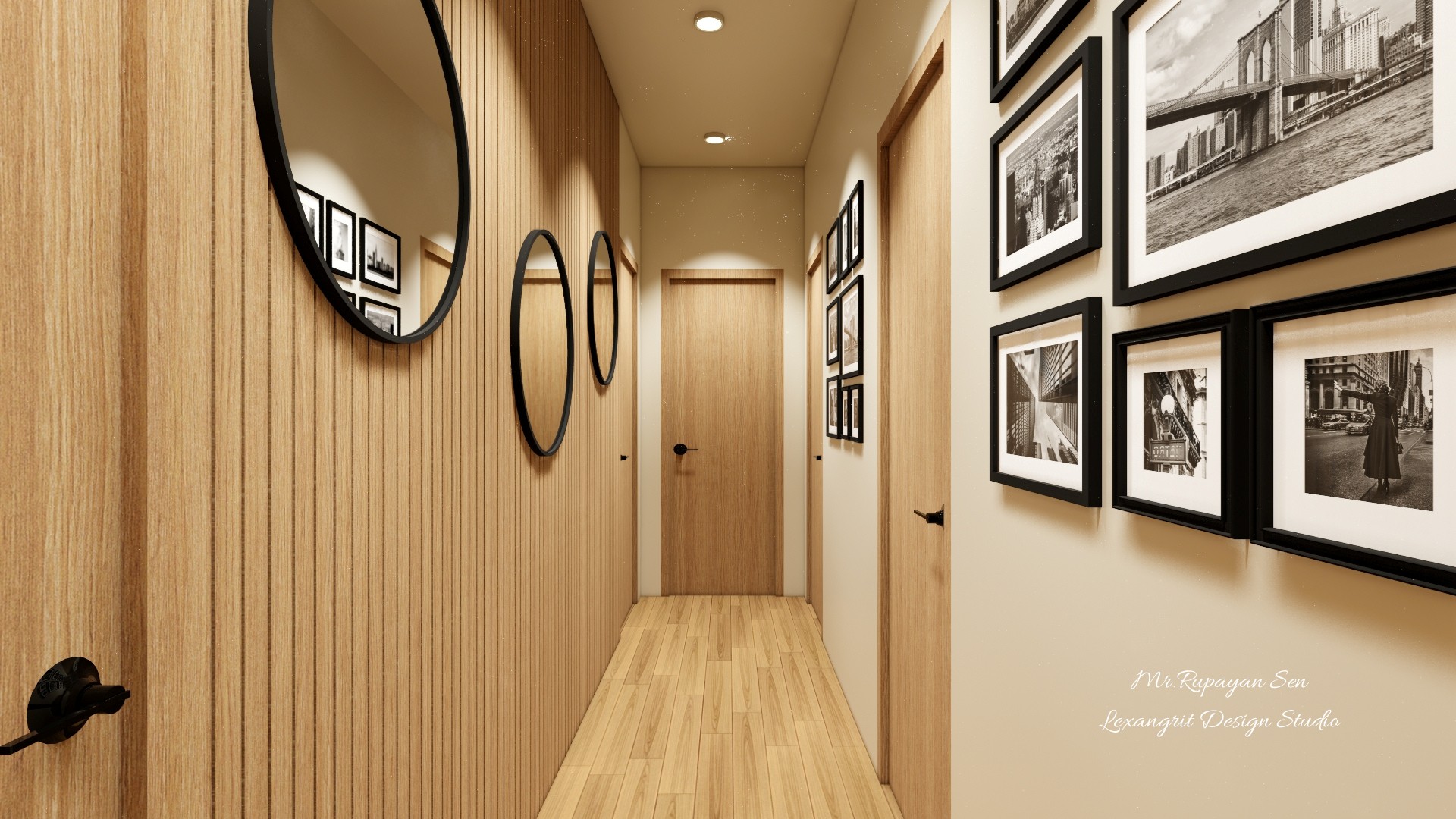Narrow hallway with vertical oak slats, round mirrors, framed black and white photos, and recessed lights.