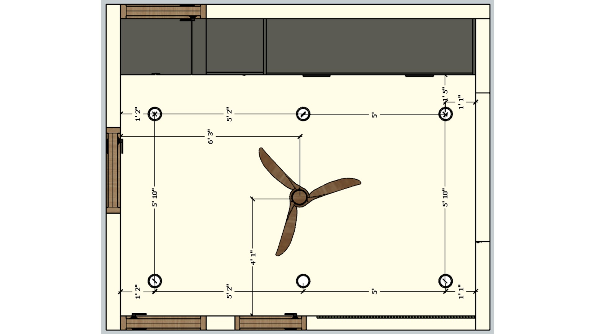 Dimensioned study lighting plan with a central fan and six ceiling lights around built in storage.