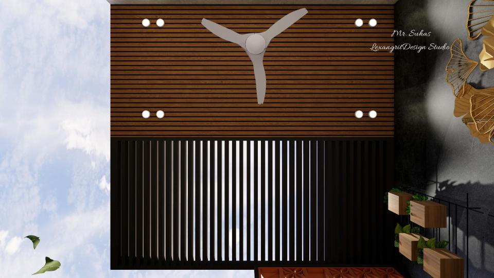 Ceiling is a combination of pvc panels & see through hallow linear lines which is designed with black finish and a fan is placed ,spotlights are given accordingly