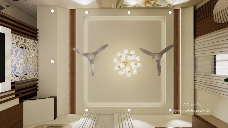 In the Ceiling chandeliar has been given at centre and two fans are given at both sides,linear depths have been created both sides with wooden finish with a cove light in it.