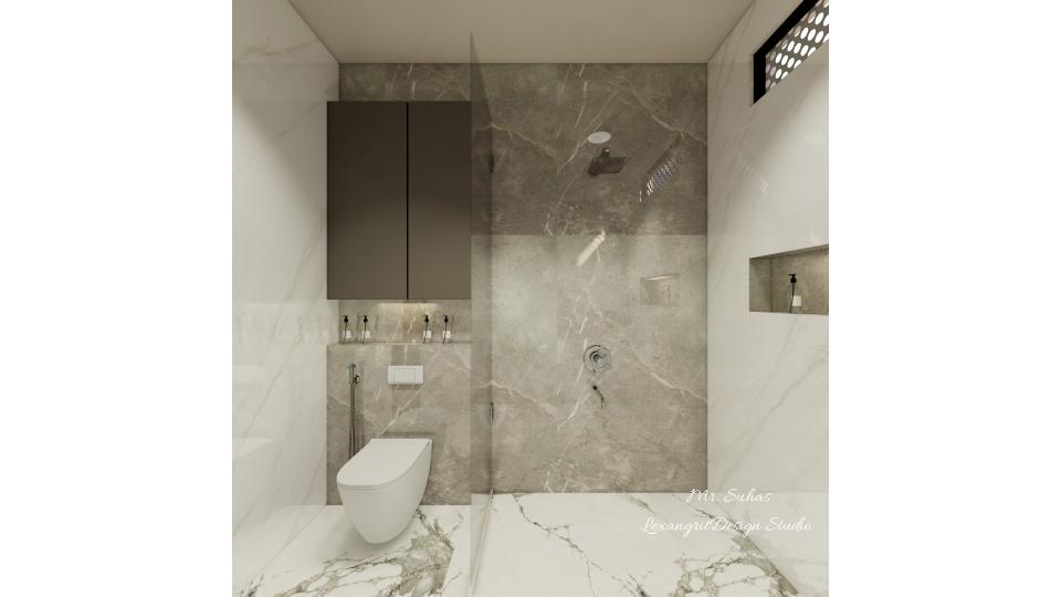 In this image we can see a toughened glass partition is placed between wc & shower area ,Niche is given for minimal storage below the ventilator ,grey textured glossy italian marble finish tile is placed for shower wall & remaining walls are designed  with grey and white mixed texture italian marble finish and black texture blend floor tiles.
