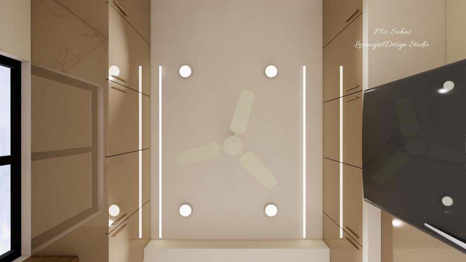 In this image we can see the falseceiling of kitchen,we've given two linear profile lights with a fan at the centre.