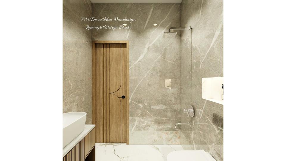 Here we can see a wall with door,full wall tiles with grey italian marble texture and flooring with white italian marble texture,on right wall we can see shower & on the left wall we can see a counter top wash basin with vanity storage.