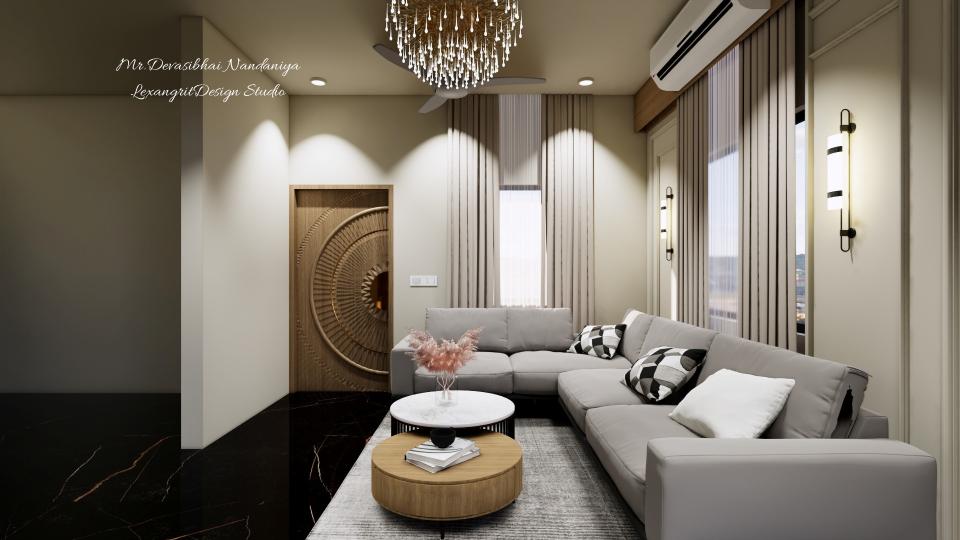 In this image we can see L-shaped sofa with grey leather fabric wth black MS legs with a combination of  two round centre tables and grey textured fabric carpet below,Main door designed with half circled cnc cut with a brass handle and wooden duco finish,long curtains are given with beige and blackout combination ,pelmet is place above the curtains for the purpose of placing AC,Flooring is designed with Black & gold textured italian marble.