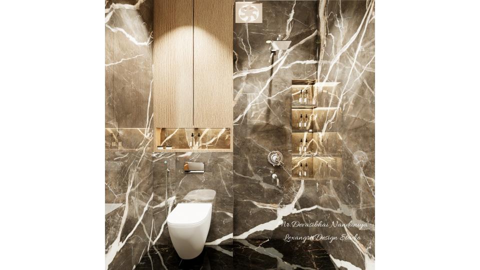 In this image we can see shower area with niche storage &  Wall mounted Wc with storage on top,exsaust is place above the shower,wall with full height black & white textured tiles,flooring with black & gold textured tiles