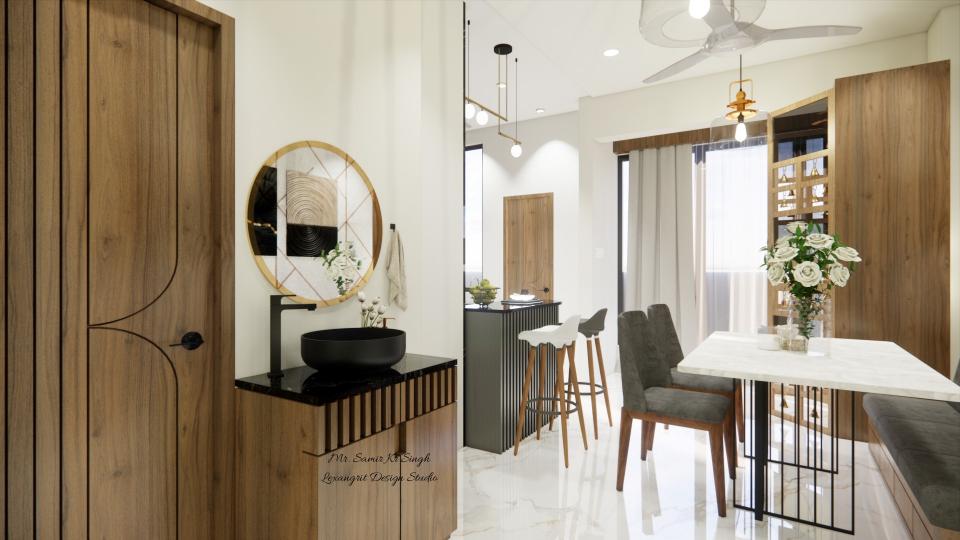dinning room where we can see a hand wash unit with round mirror and full height vanity unit with black granite and matt black bowl sink or besin design, a dinning tavle with white quartz and black powdwer coated iron stand, and brakefast counter table of a kitchen having black granite slab